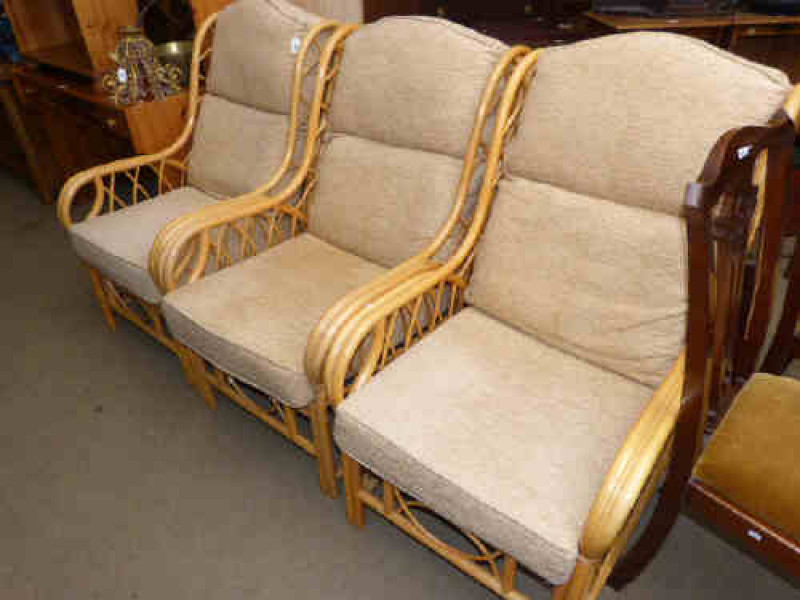 Set of three cane conservatory chairs in fawn fabric