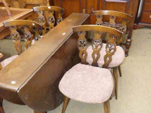 1920's oak two door sideboard, slim Ercol drop leaf dining table and four...