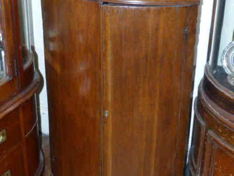 19th Century oak bow front double door hanging corner cabinet