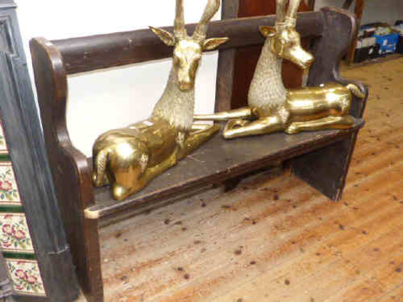 Stained pitch pine pew with single rail back