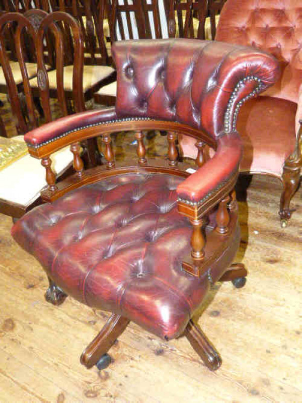 Mahogany red button leather swivel office chair