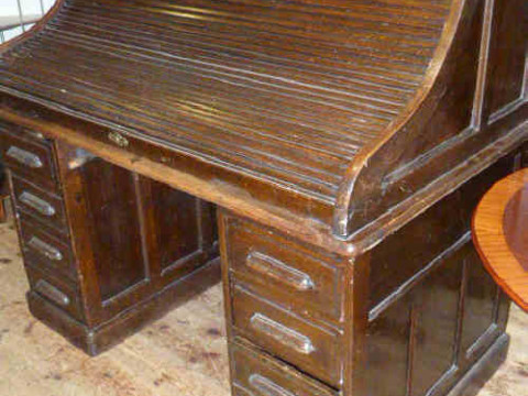 Oak S shaped double pedestal roll top desk