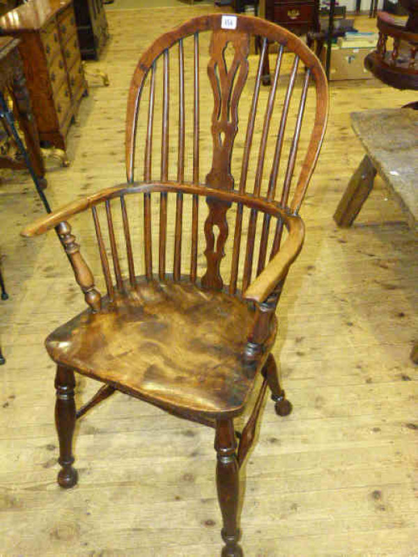 Antique elm pierced splat back Windsor elbow chair