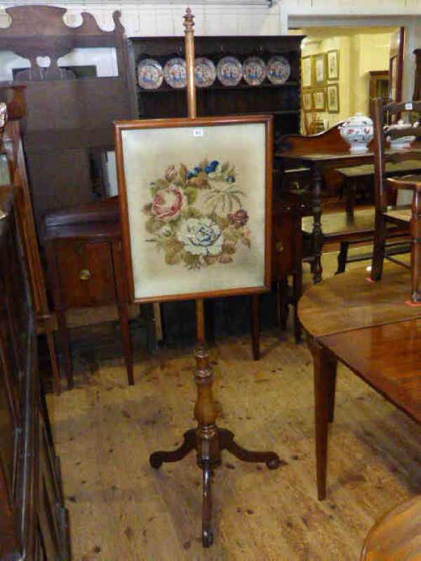 Victorian mahogany tripod pole screen with glazed floral wool work panel