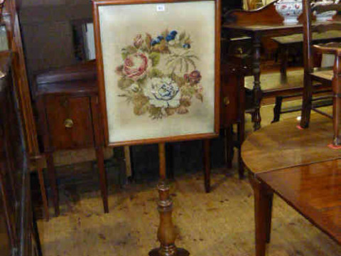 Victorian mahogany tripod pole screen with glazed floral wool work panel