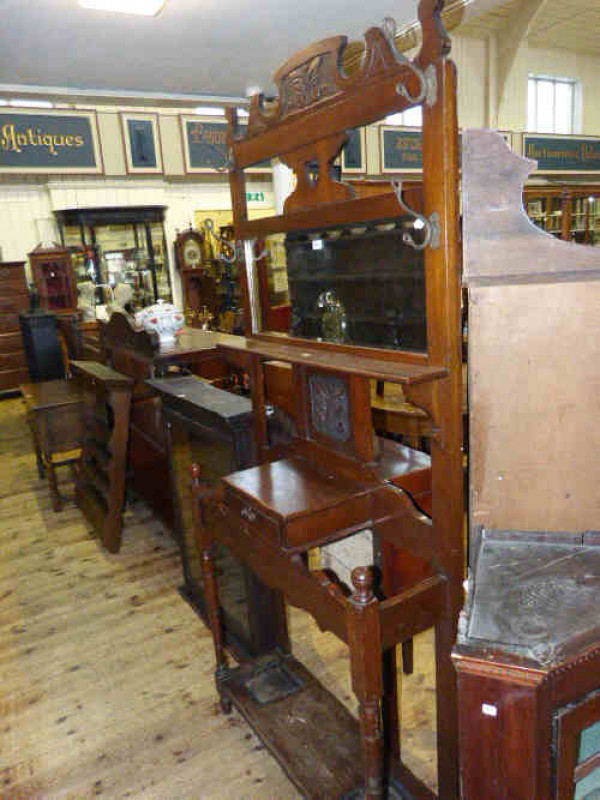 Edwardian walnut mirror backed hall stand