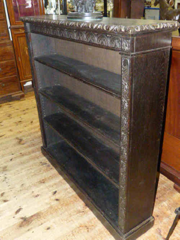 Victorian carved dark oak four tier open bookcase