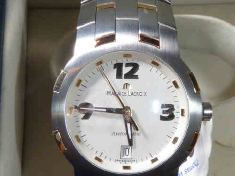 Maurice Lacroix Automatic stainless steel wristwatch, with yellow metal...