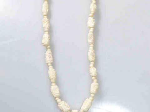 Carved necklace
