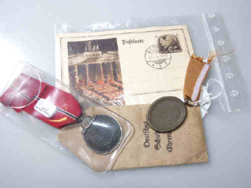 Two German medals and a postcard