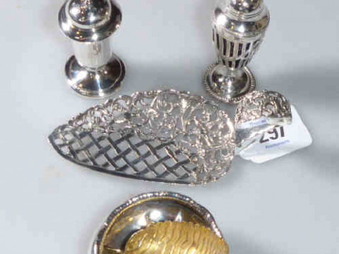 Continental silver pierced slice, silver salt, silver-gilt spoon and two...