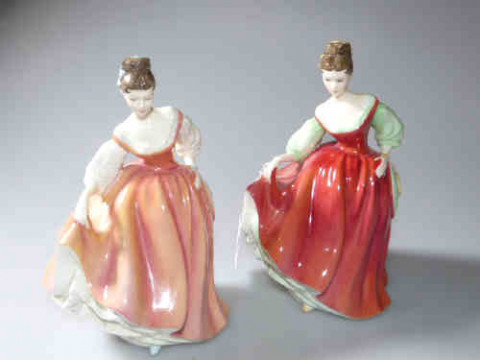 Two Royal Doulton figures, Fair Lady, HN2832 and Fair Lady (Coral Pink),...