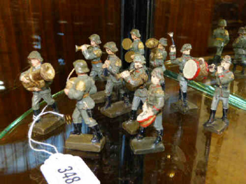 Ten piece toy soldier band, marked LINEO?