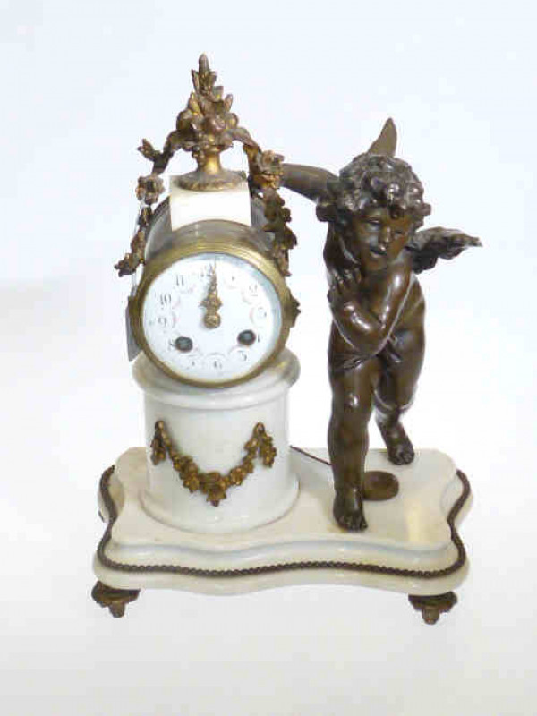 French alabaster mantel clock with bronze putti and ormolu mount and feet, the movement stamped SH Paris