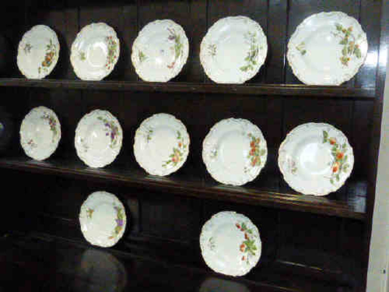 Set of twelve Royal Doulton fruit decorated plates, signed E.S. Brown