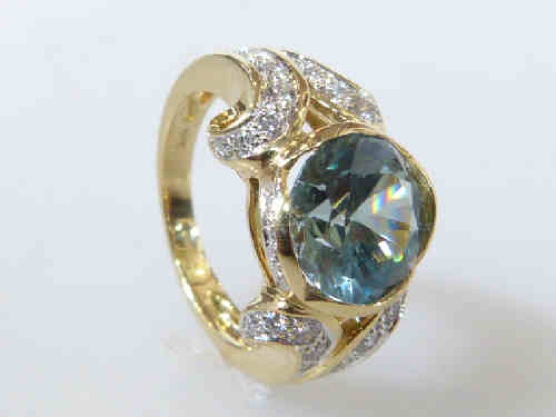 Blue Zircon and diamond ring, hallmarked 18ct gold, size N