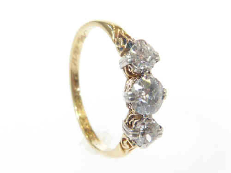 Three stone diamond ring, the band inscribed and dated 1905, total weight of diamonds approximately 0.83 carats, size P