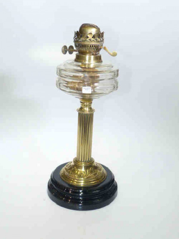 Brass reeded column oil lamp with clear glass reservoir