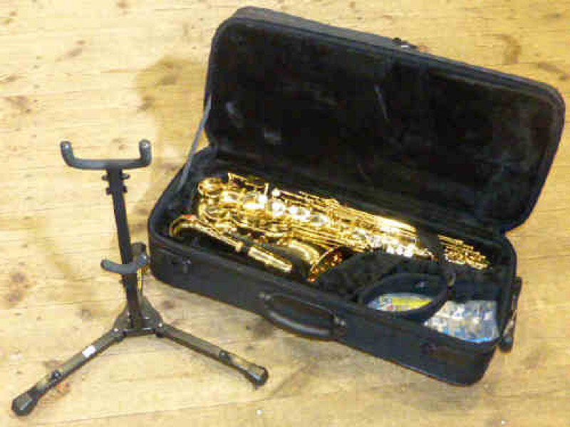 Jupiter saxophone in canvas case and stand