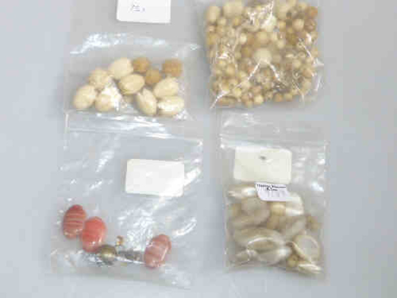 Ivory, mother of pearl and other beads