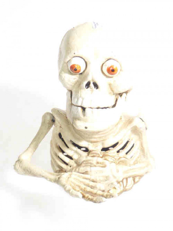Cast metal skeleton money box
