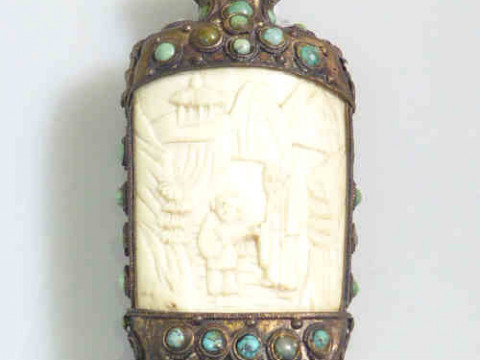 Ornate metal scent bottle set with blue stone and two carved ivory panels