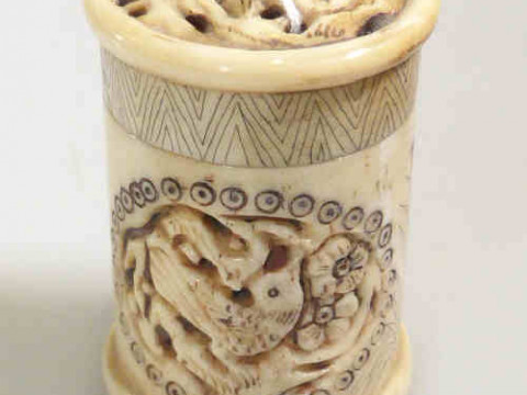 Antique carved ivory cylindrical gaming counter holder, 6cm high