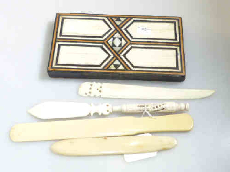 Ivory/bone Stanhope letter knife, three page turners and inlaid block (5)