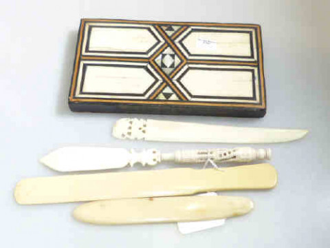Ivory/bone Stanhope letter knife, three page turners and inlaid block...