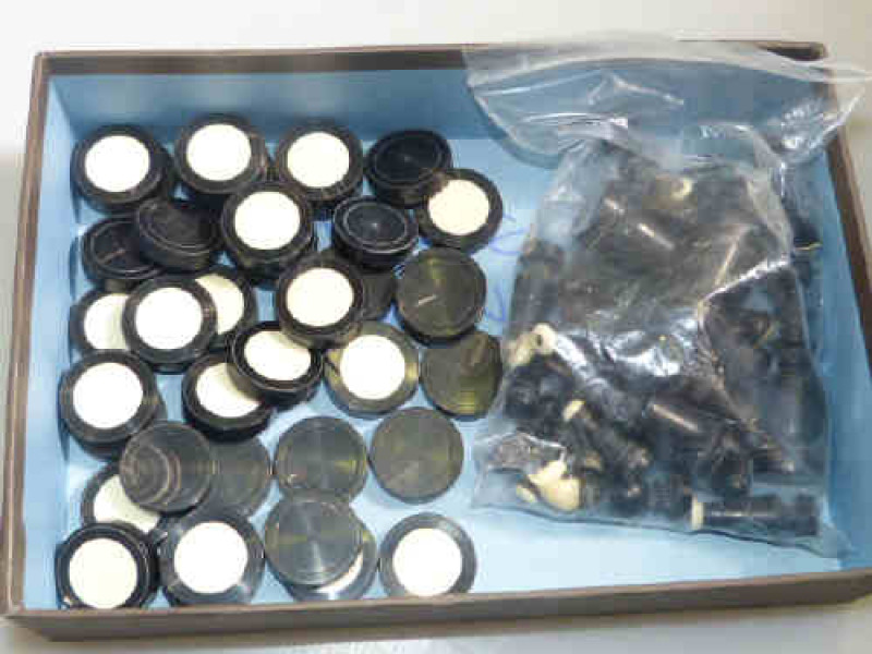 Box of ivory/bone chess and draught pieces