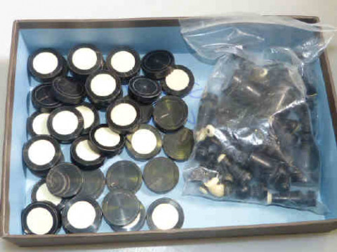 Box of ivory/bone chess and draught pieces