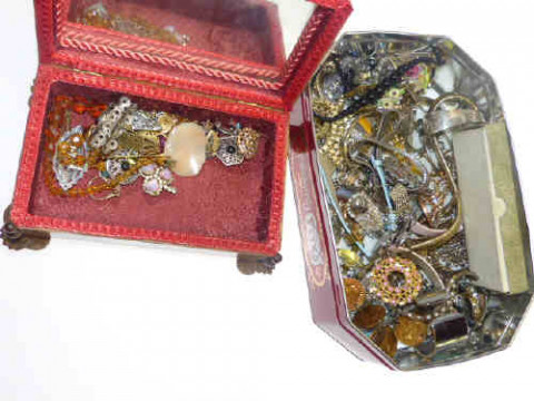 Tin and box of costume jewellery