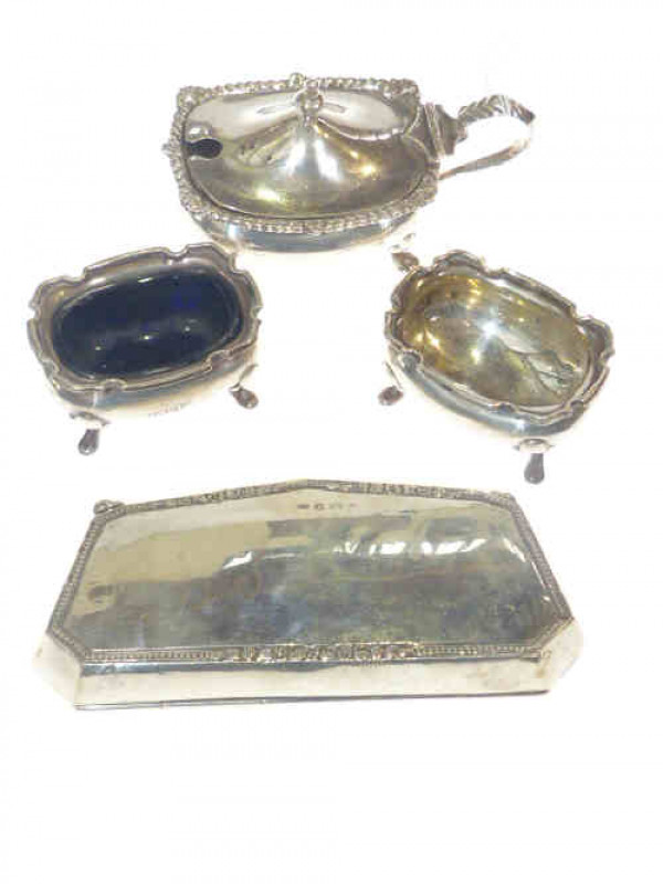 Silver purse and silver cruet set (4)