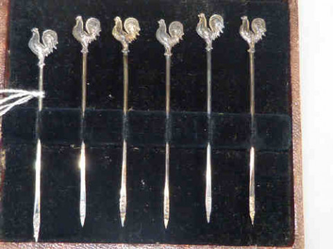 Cased silver cocktail sticks with cockerel terminals