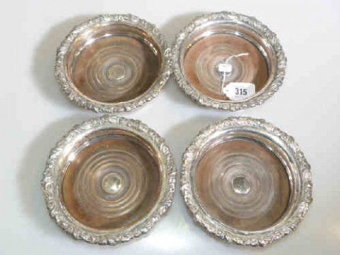 Set of four Sheffield plated wine bottle coasters