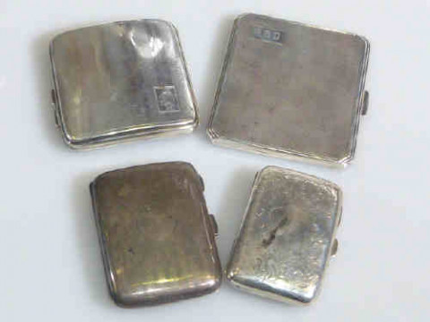Four silver cigarette cases