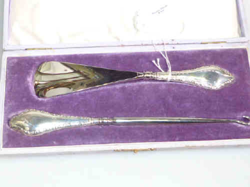 Cased silver handled button hook and shoe horn