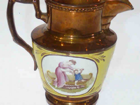 19th Century copper lustre jug having printed and painted decoration on...