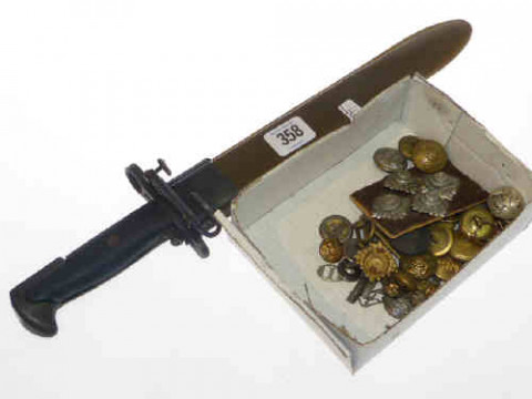 Dagger and box of buttons