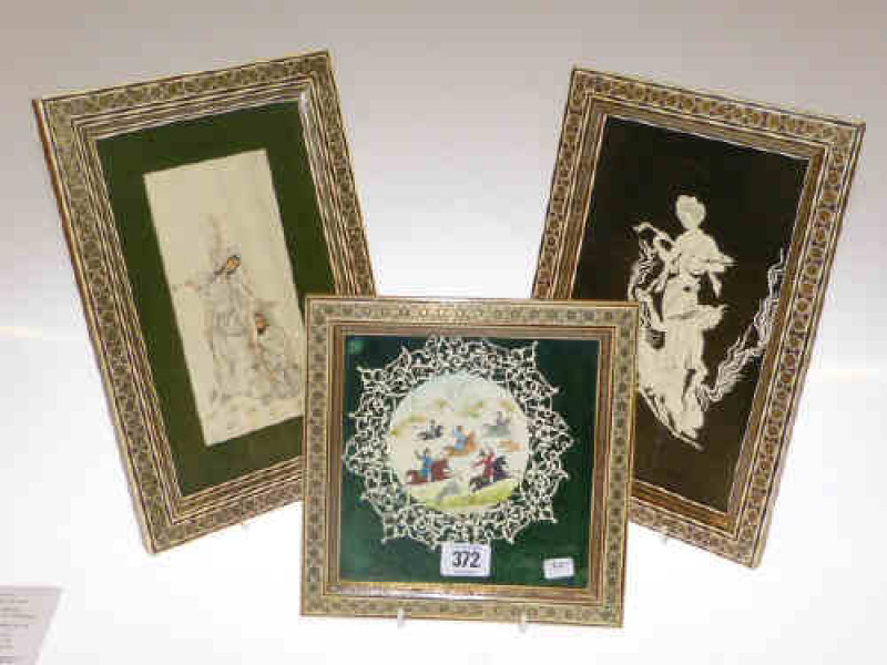 Three Persian ivory pictures in ivory and wood inlaid frame