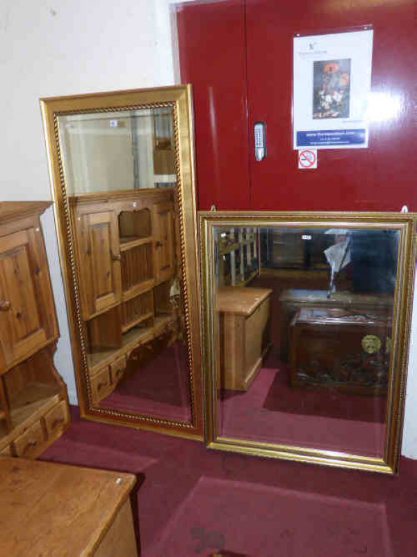 Two rectangular gilt framed bevelled wall mirrors