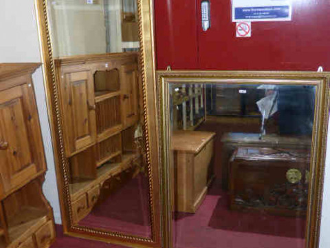 Two rectangular gilt framed bevelled wall mirrors