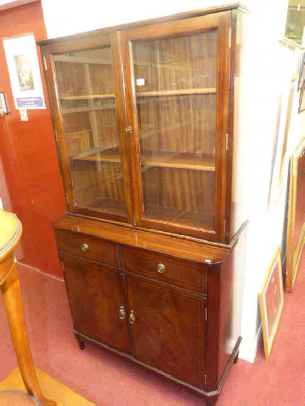 Mahogany four door cabinet bookcase