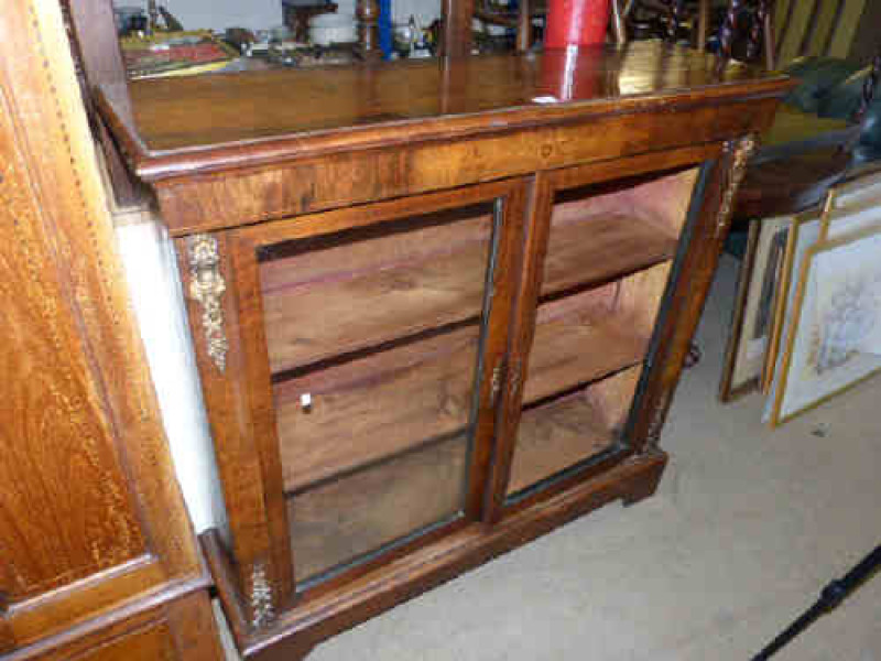 Victorian inlaid walnut and gilt mounted two door pier cabinet (right hand door lacking glazed panel)