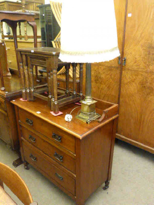Late Victorian three drawer walnut chest, oak nest of three tables and brass table lamp and shade