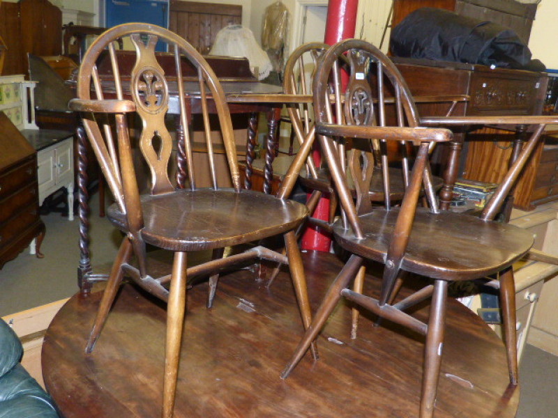 Three Ercol elbow chairs and oak barley twist side table (4)