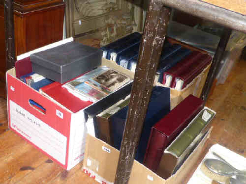 Two boxes of stamps and first day covers, stamp albums, coins and textile picture