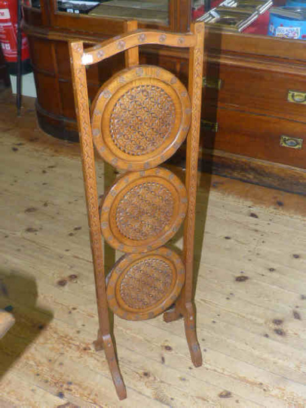 Carved mahogany three tier cakestand