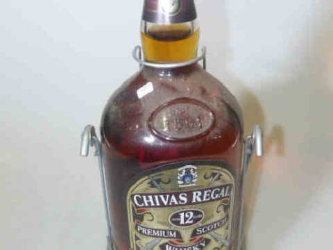 4.5 litre bottle of Chivas Regal Premium Scotch Whisky on rocking stand