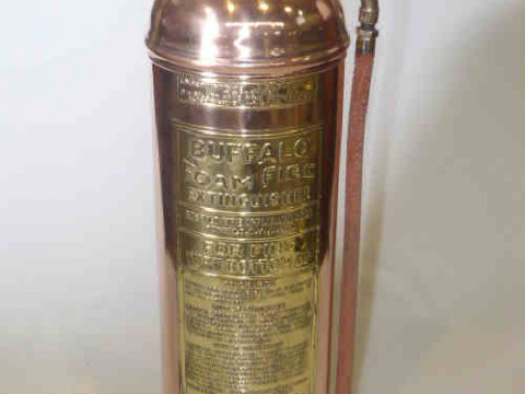 Old fashioned style copper and brass fire extinguisher